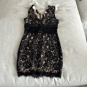 Size 6 black lace nude slip dress. Worn once.